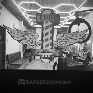De ruit van Barbershop Eddy